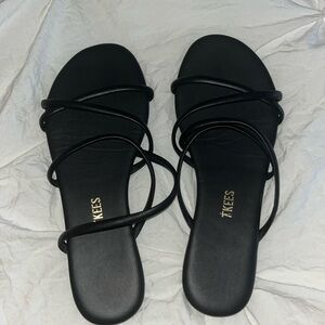 Black Tkees sandals